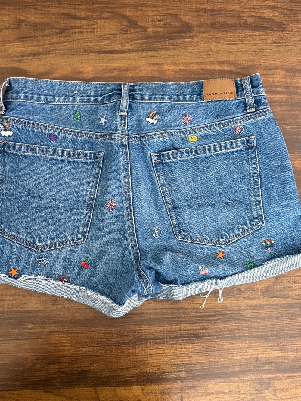 American Eagle Outfitters Blue Denim Shorts with Colorful Embroidery - Picture 2 of 3